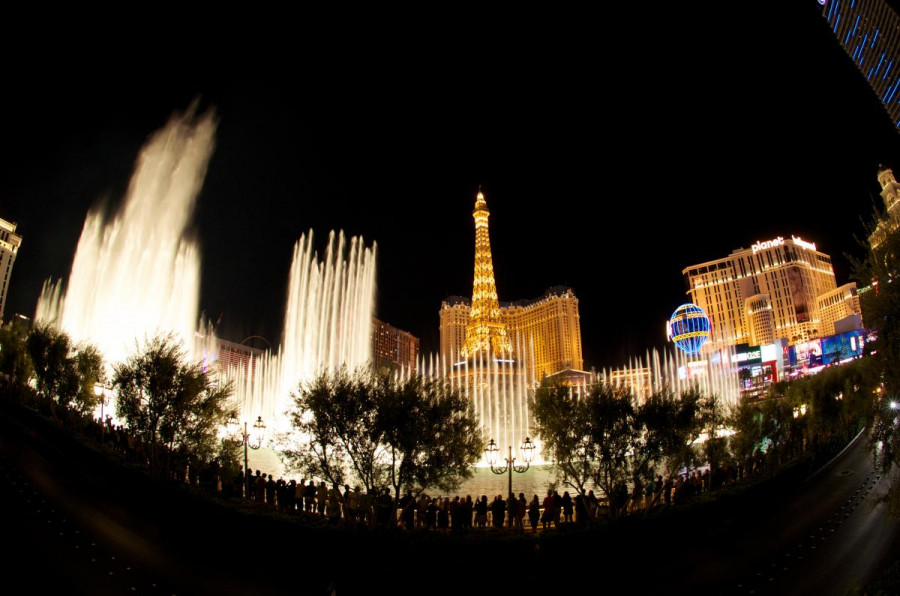 Neon-lit buildingd and water display in Las Vegas