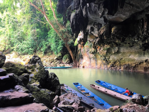 Boats on the water in a cave